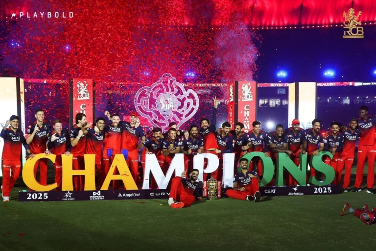 Rajat Patidar and Virat Kohli lift the IPL 2025 trophy as Royal Challengers Bangalore celebrate their first-ever championship victory.